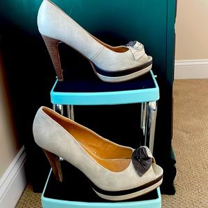 Escape platform peep toe heels.